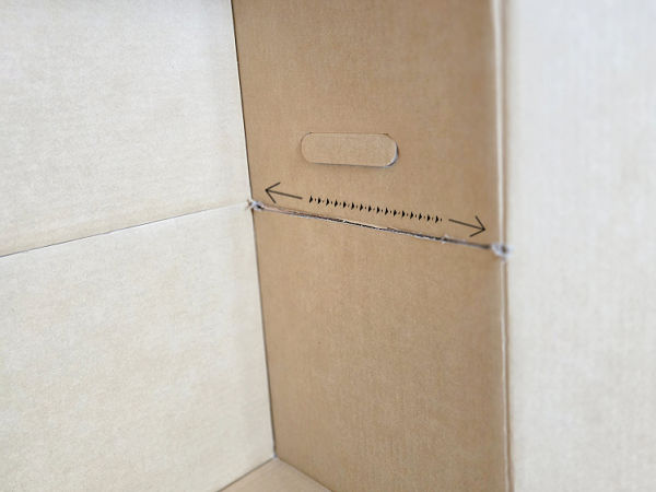 line showing where cut should be made in the side of box