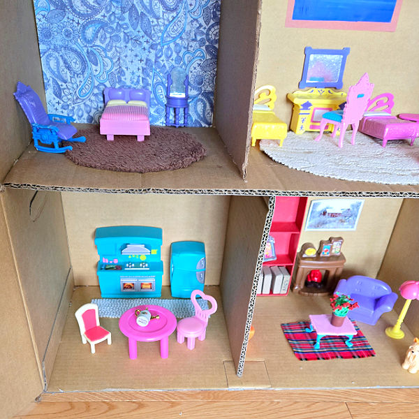 decorations and doll house furniture added to the play space