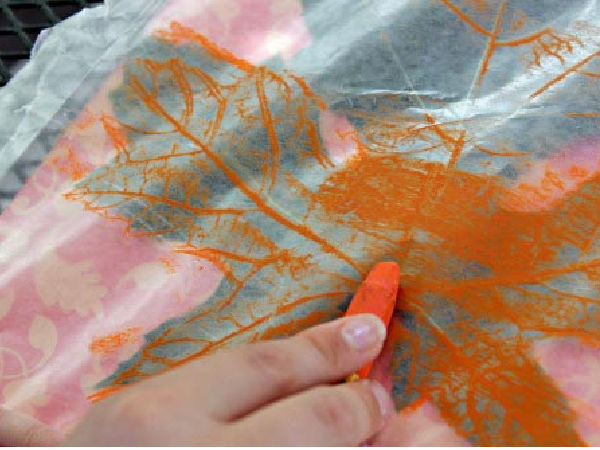 rub crayons or chalk in a fall leaf craft to make a picture