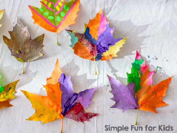 paint fall leaves in a fall leaf craft for kids