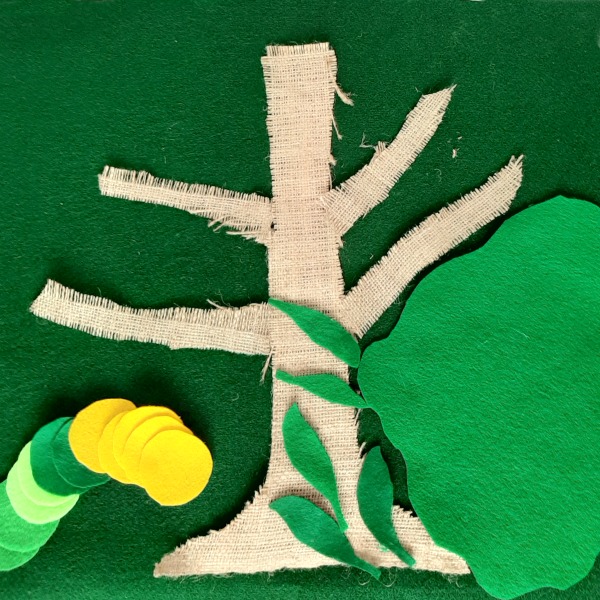 Felt circles and burlap tree for a caterpillar activity on the felt board