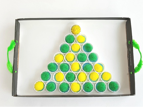 Fine motor activity with bottle caps and pompoms