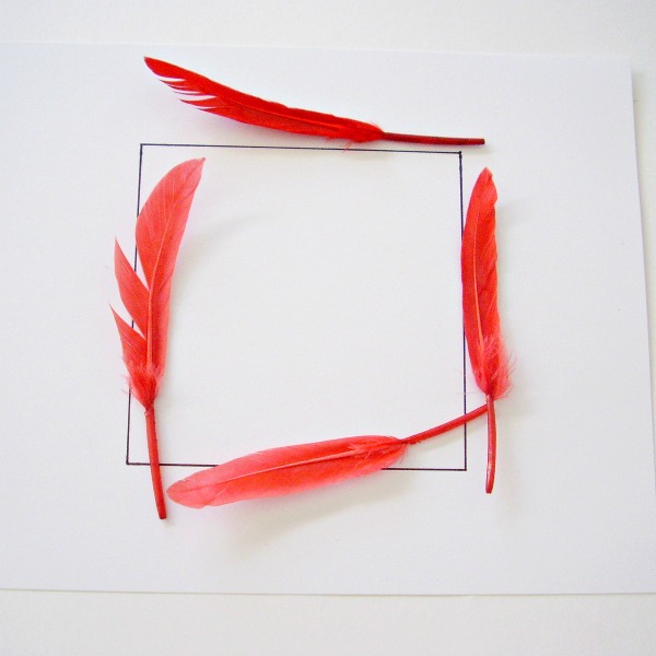 Square shape outlined with feathers in a fine motor sensory activity