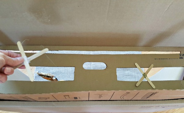Butterfly marionettes in a homemade puppet theater