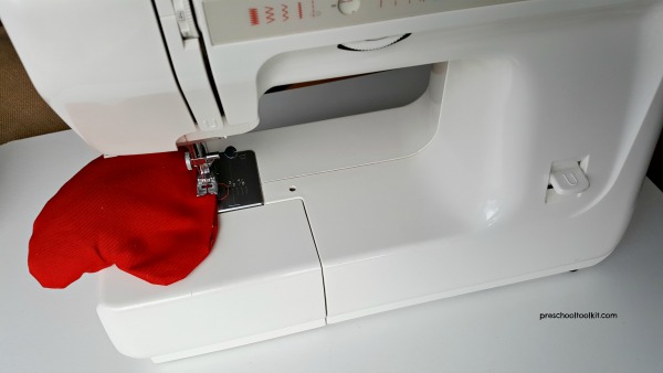 Sew bean bag opening to secure rice filler