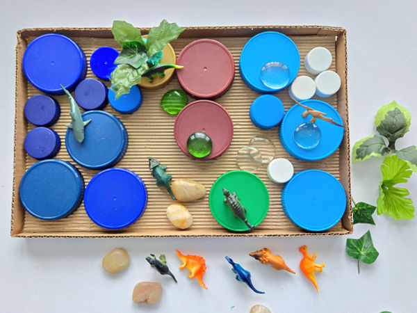 create small world play environment for dinosaur toys