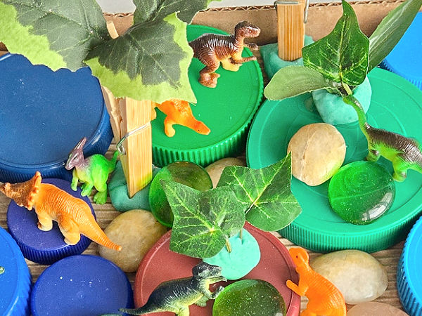 loose parts STEM play dinosaur theme for preschool