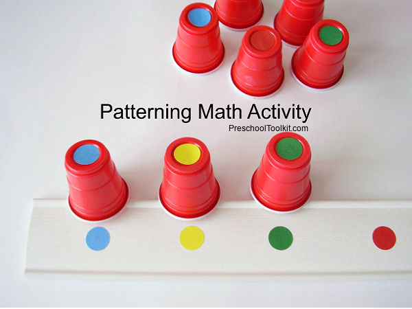 beginner math with plastic cups and dots