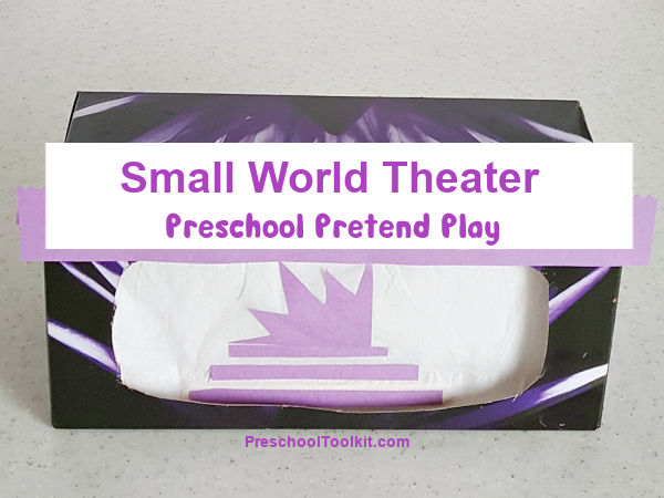 pretend play with a cardboard box theater