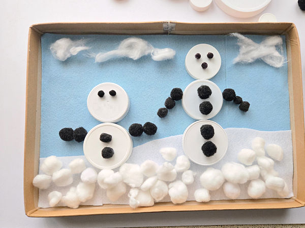 jar lid snow people with cotton ball snow and clouds
